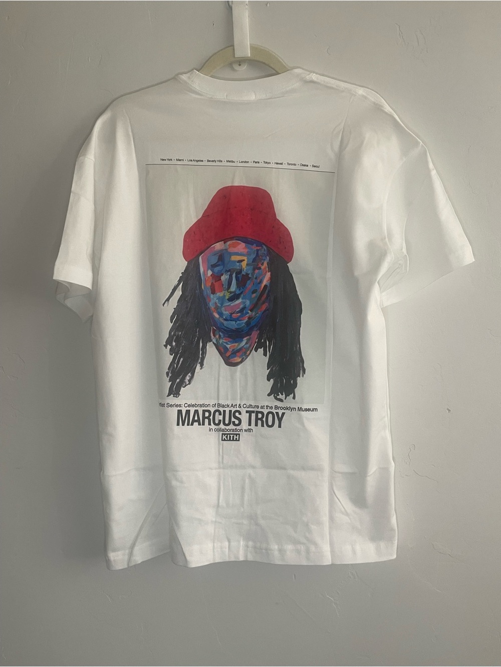 Kith White Graphic Tee with Red Hat & Multicolor Face